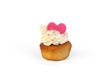 Delicious cupcake with white cream and sprinkles isolated on white background.
