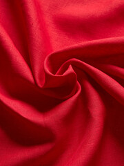 Obraz premium Close-Up of Red Fabric With Soft and Elegant Folds in Studio Lighting
