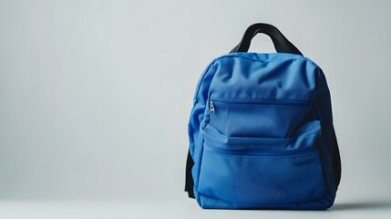 A school backpack placed against a white background.