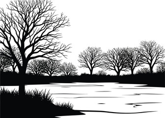 Silhouette of bare trees reflected in water creating a stark winter landscape