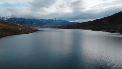 Aerial view of patagonia lake and andes mountains. Media