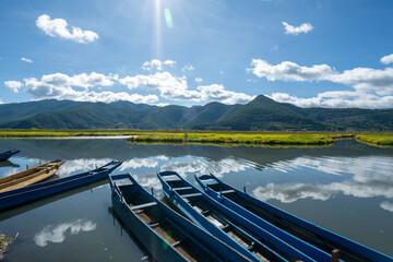 Pig trough boats on the lake, Lugu Lake in Yunnan, China