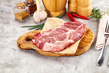 Raw pork neck steak for grill
