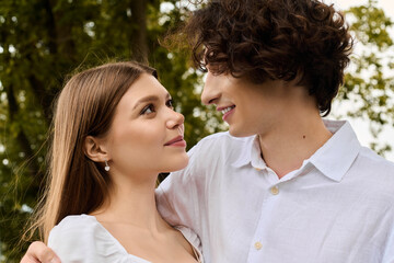 Fototapeta premium Joyful young couple enjoying outdoor moments filled with love and laughter