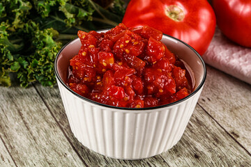 Diced ripe tomato with sauce