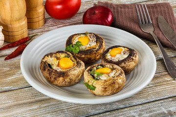 Baked champignon with quail egg