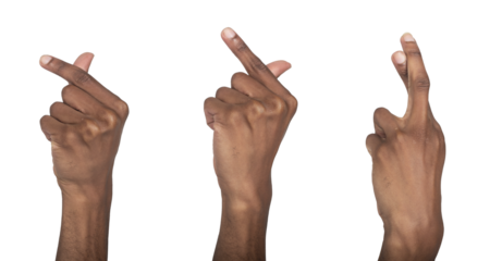 Hand gesture forming heart sign with thumb and index finger in crossing pose. Black skin male making