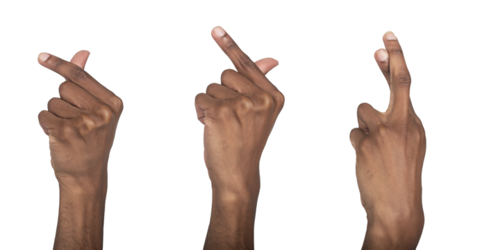 Hand gesture forming heart sign with thumb and index finger in crossing pose. Black skin male making