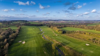 Bird's-eye view of a golf course set in a countryside location