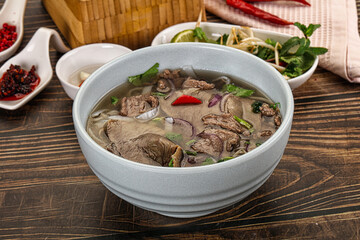 Vietnamese Pho Bo soup with beef and noodles