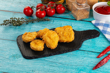 Golden crispy fried chicken nuggets