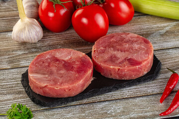 Raw round tuna fish fillet