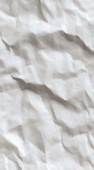 Obraz premium Crumpled Sheet: A close-up shot of a textured sheet, with subtle shadows creating a mesmerizing display of folds and lines, inviting one to explore the tactile nature of this ordinary object.
