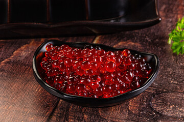 Salmon red caviar in the bowl