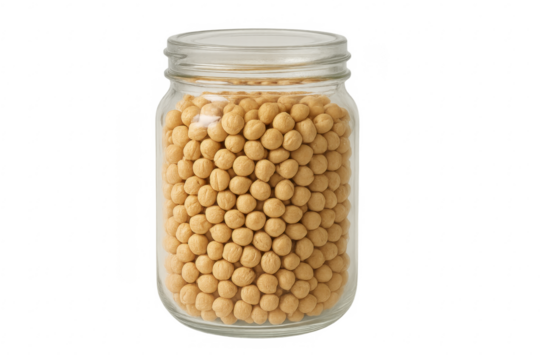 Chickpeas filling glass jar for healthy eating