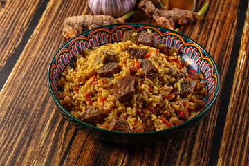 Asian traditional pilaf with beef