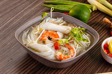 Vietnamese soup Pho with seafood