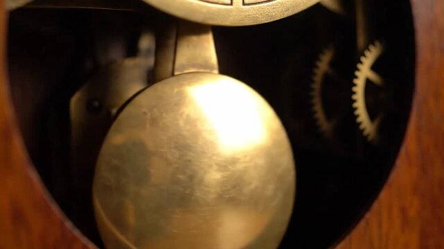 Close up of a pendulum clock mechanism antique object details