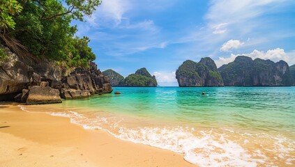 Obraz premium Crystal-clear waters and jagged rocks basking in the intense sunlight at a scenic coastal spot.