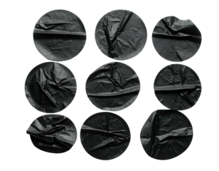 Nine textured black circular shapes with folds and lines against a stark black background