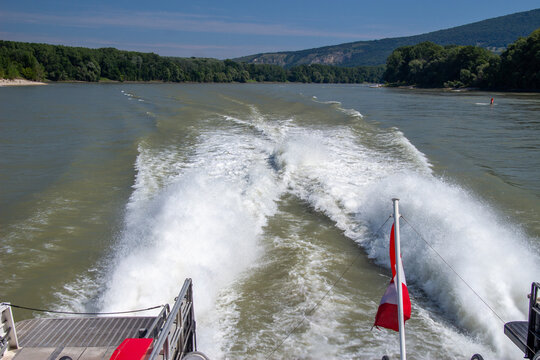 Wake - the water pattern left behind a moving boat - Powered by Adobe