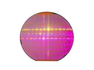 Semiconductor silicon wafer disk made of silicon isolated on white background