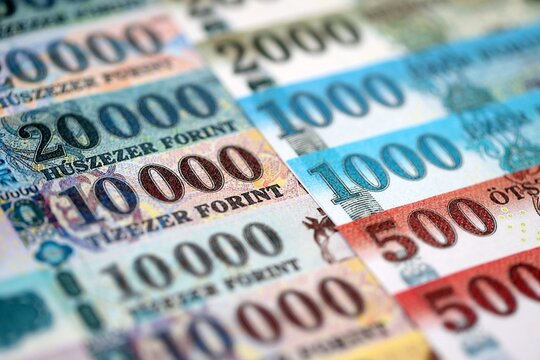 Hungarian Forints currency money bills in big amount. Many HUF currency banknotes with different denomination close up