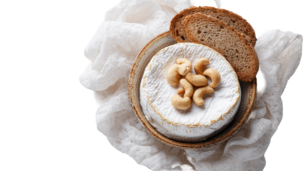 Round camembert cheese with nuts and bread isolated on transparent background