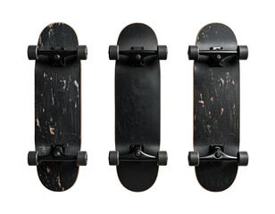 Three well-worn, black skateboards, showcasing wear and tear, isolated on a black background