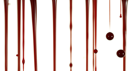 Freeze Motion of Photograph of Dripping Blood Forming Thin Streams and Scattered Droplets on a Clean White Background. Ideal for Horror, Medical, or Crime Related Visual Concepts.