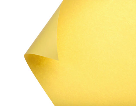 A close-up of a folded yellow paper corner against a stark black backdrop - Powered by Adobe