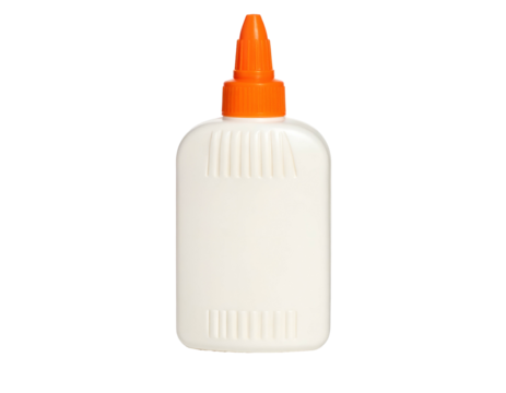 Close-up of a plastic, white glue bottle with an orange cap against a black background