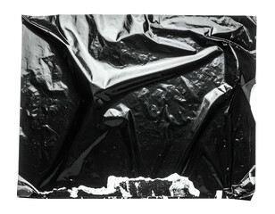 Abstract composition featuring a reflective black surface with crumpled and textured details
