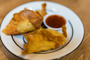 A delicious platter of crispy fried dumplings ready to enjoy