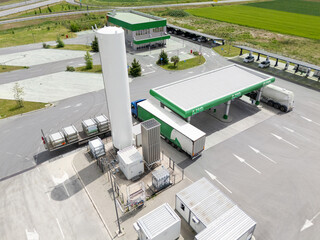 CNG and LPG gas station with charging hub for electric vehicles with solar canopy. Aerial view