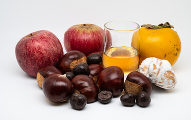 A composition of typically autumnal fruits such as chestnuts, persimmons or the Campanian Annurca apple, enhancing their beauty and detail.