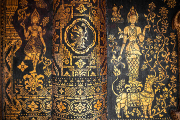 Intricate black and gold details in Wat Xieng Thong in Luang Prabang, Laos