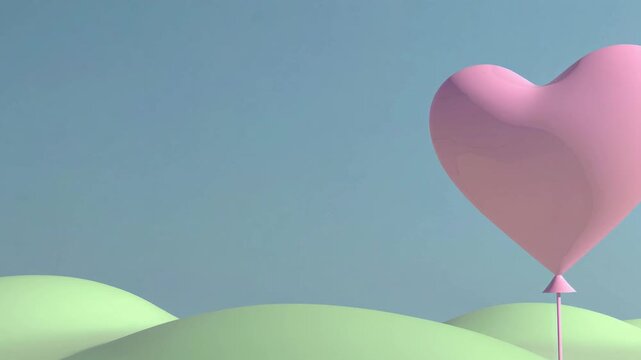 Ballon rose en forme de c&oelig;ur dans paysage pastel
