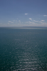 Ripples on the sea water under a cloudy sky