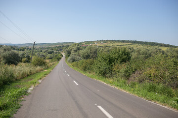 Modern rural road covered with asphalt
