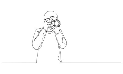 Continuous Line Drawing of a Photographer with a Camera