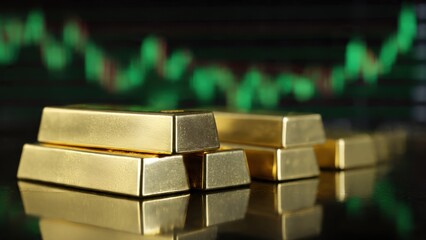 Gold bars displayed with financial graphs investment insights business environment close-up view wealth growth