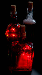 dark mystical theme red whine bottle