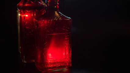 dark mystical theme red whine bottle
