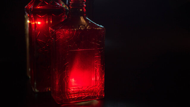 dark mystical theme red whine bottle