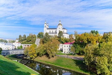 Vitebsk, Belarus, October 8, 2025. Autumn view of the temple complex by the river.                               