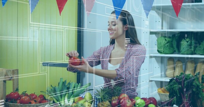 Handling vendor wearing plaid shirt adjusting tomato at stall, with crates, shelves and overlay