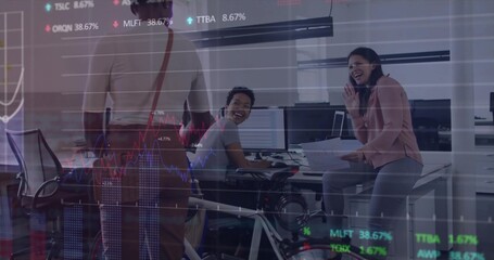 Collaborating three women analyzing stock charts on monitors in office, with wheelchair, bicycle