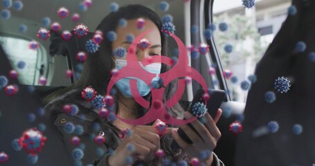 Tapping smartphone woman wearing blue mask in car back seat, with red biohazard and virus graphics