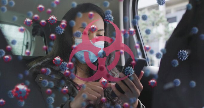 Tapping smartphone woman wearing blue mask in car back seat, with red biohazard and virus graphics - Powered by Adobe